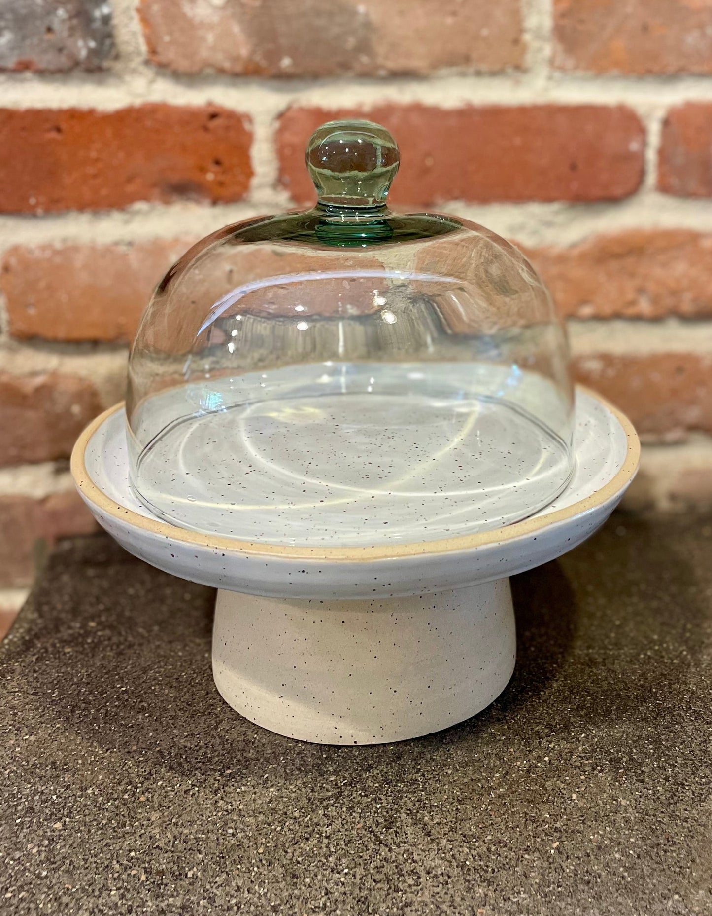 cake stand with glass cloche